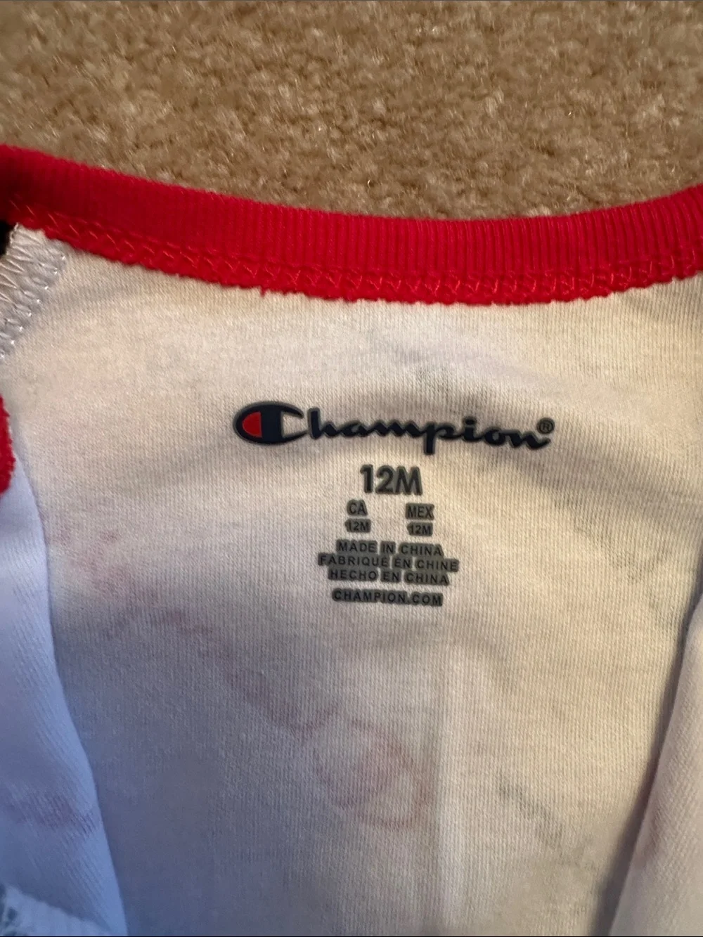Champion White One-Piece with Navy Sleeves & Red Trim
